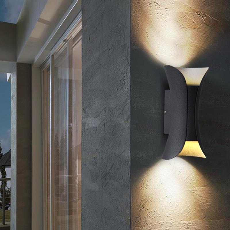Águeda wall light detail showing aluminum construction and IP54 weatherproofing