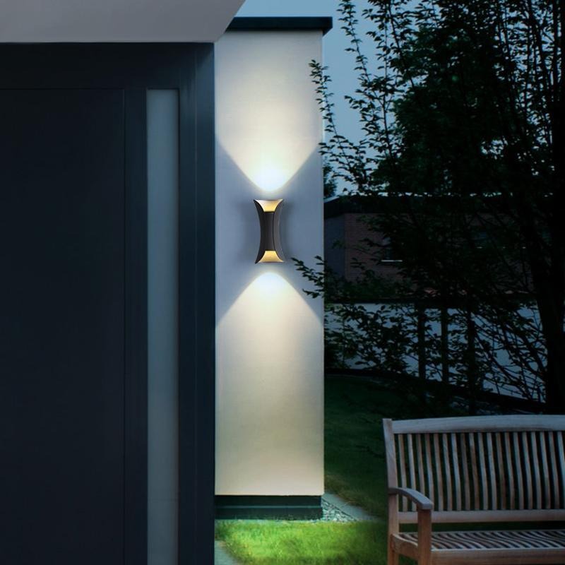 Águeda wall light in hallway showing soft interior illumination