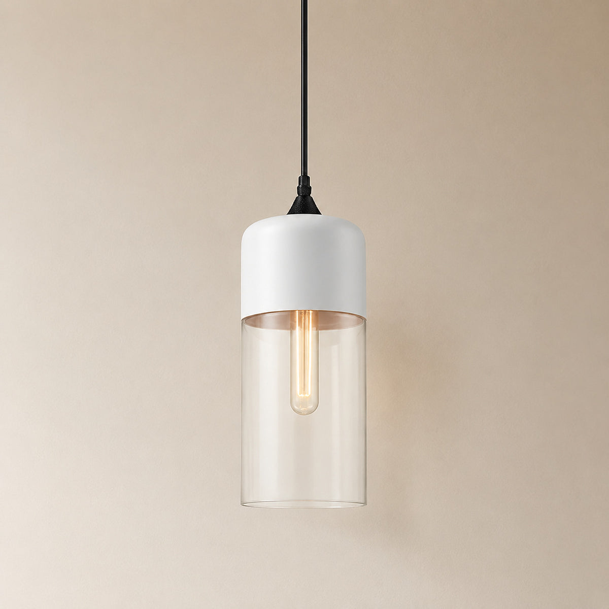 Alge glass pendant with a white cap and a clear glass shade, a tall narrow cylinder measuring 33 by 13 cm