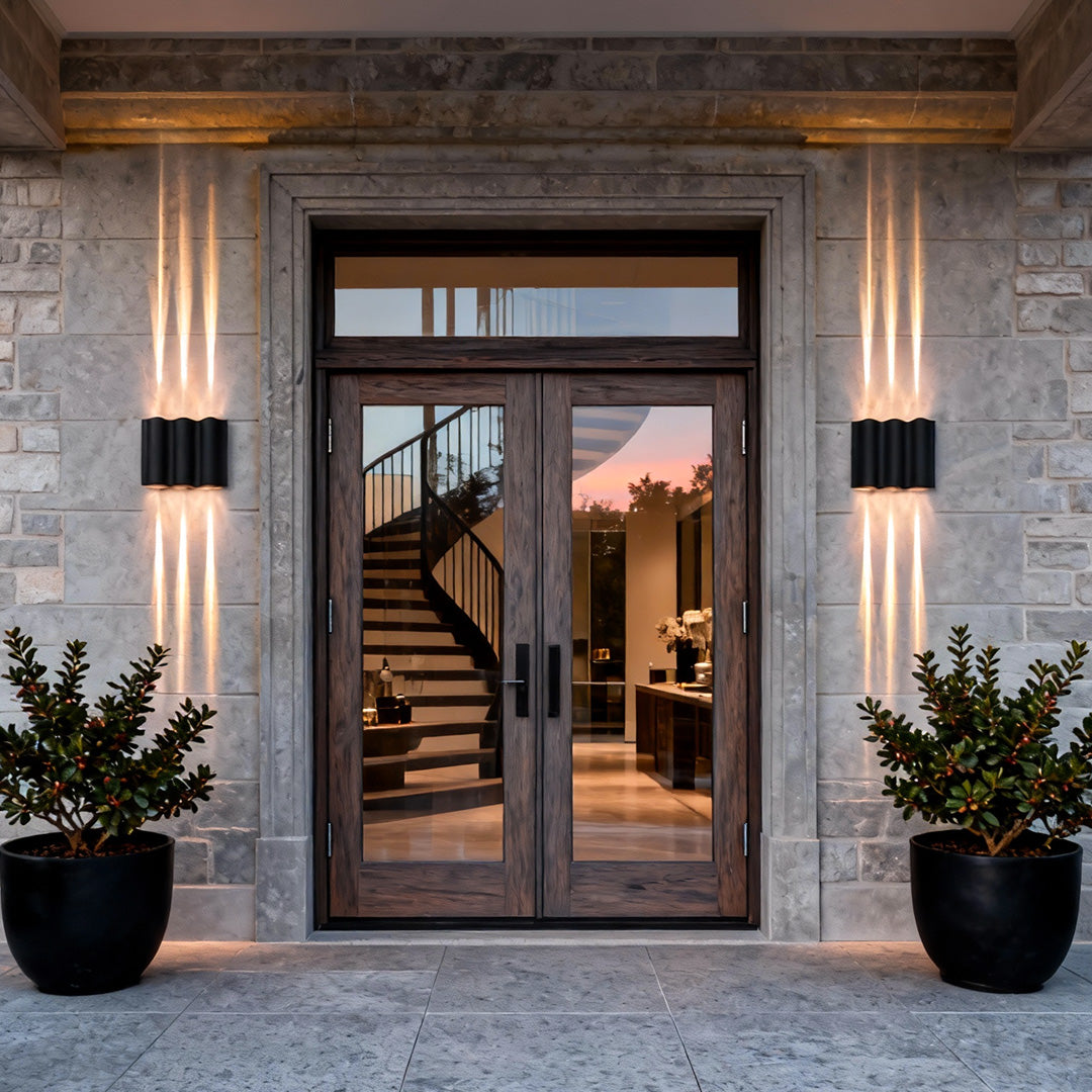 Almeida outdoor wall sconce in black, wavy aluminum, side profile