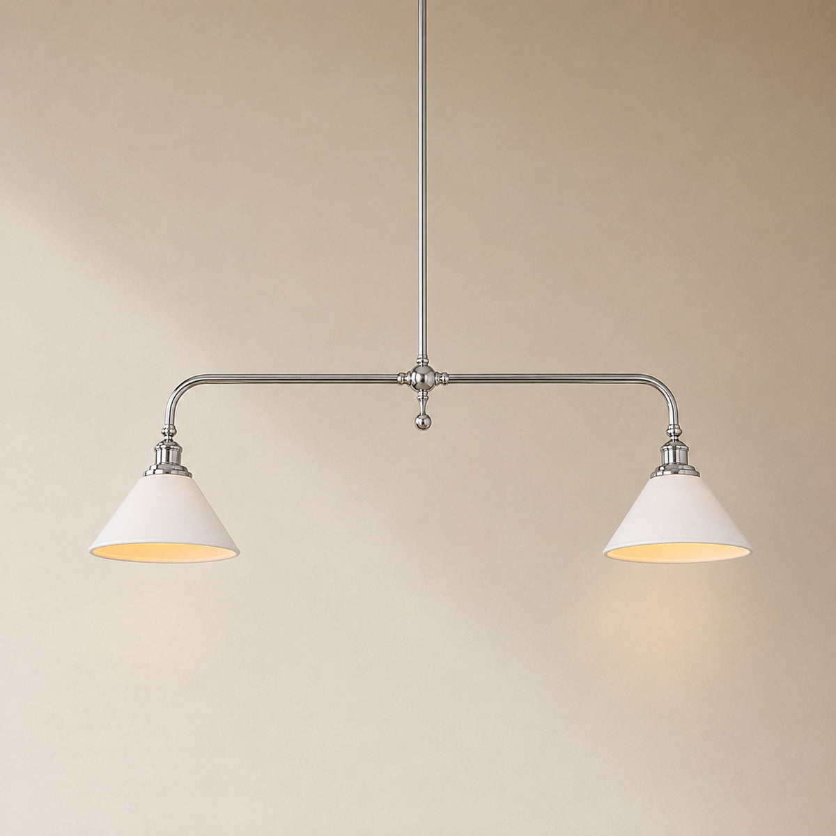 Ardila linear pendant with a polished chrome bar and two white ceramic shades