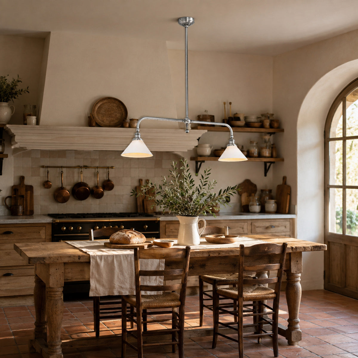 Ardila linear pendant with a polished chrome bar and two white ceramic shades, shown in a room