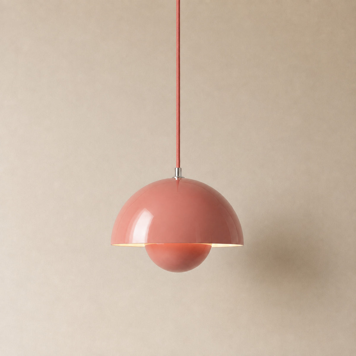 Ave hemisphere pendant in shrimp powder on a matching fabric cord, 16 cm tall