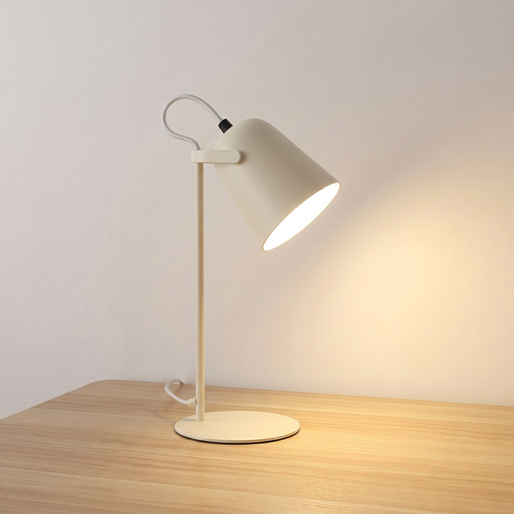 Iron bucket table lamp in macaron pink with tilting shade head, product shot.