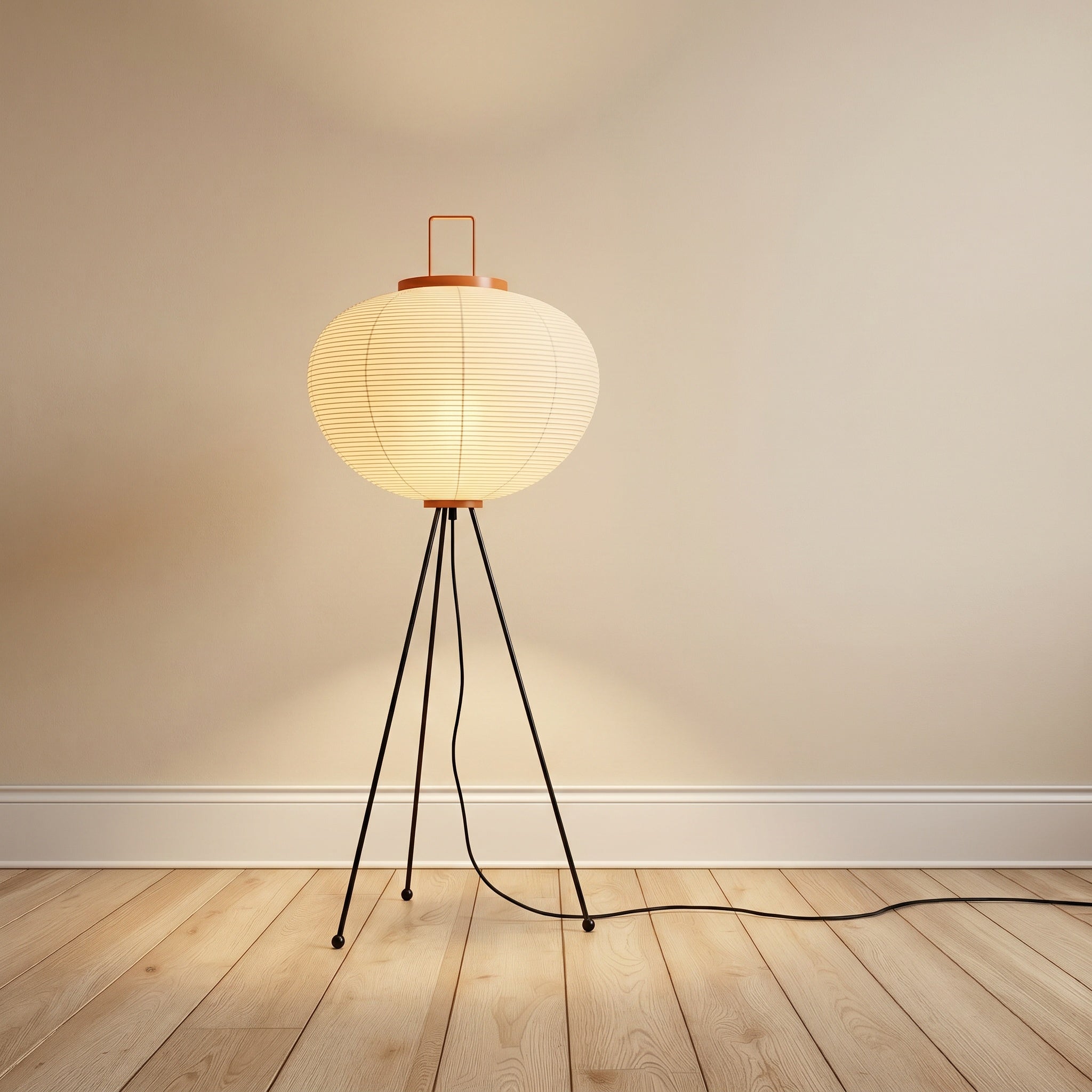 Mulberry-paper floor lamp, round lantern shape on a black tripod, product shot.