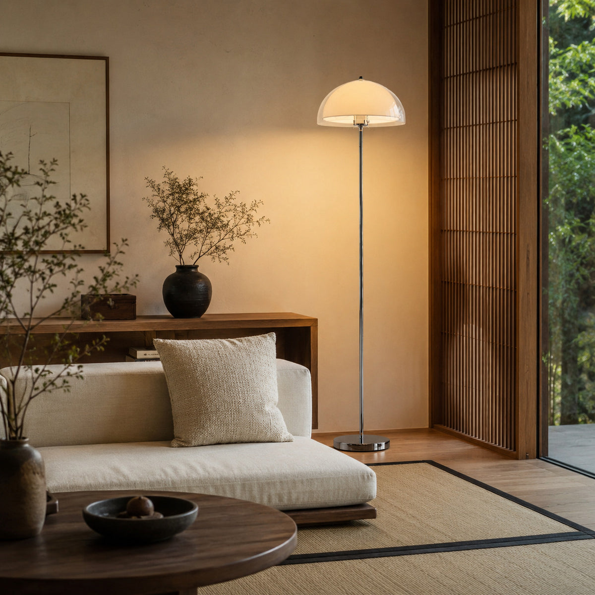 Benavente floor lamp with a cream inner dome, lit in a Japandi living room beside a shoji screen