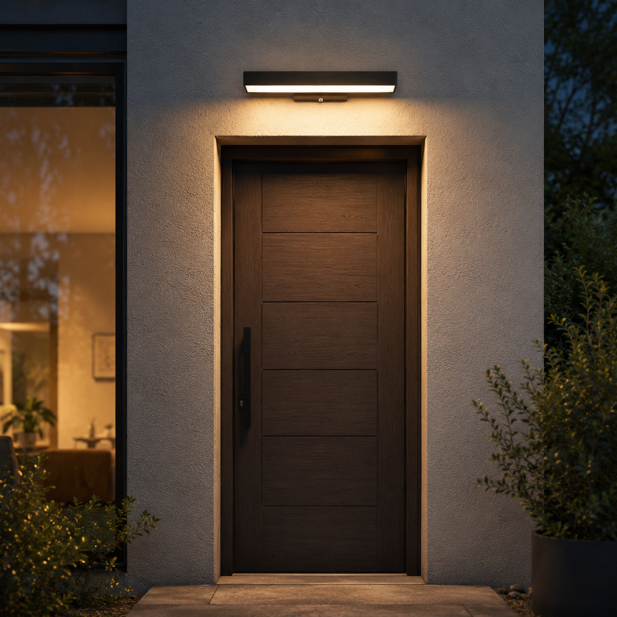 Caminha linear outdoor wall light, hero shot in black matte