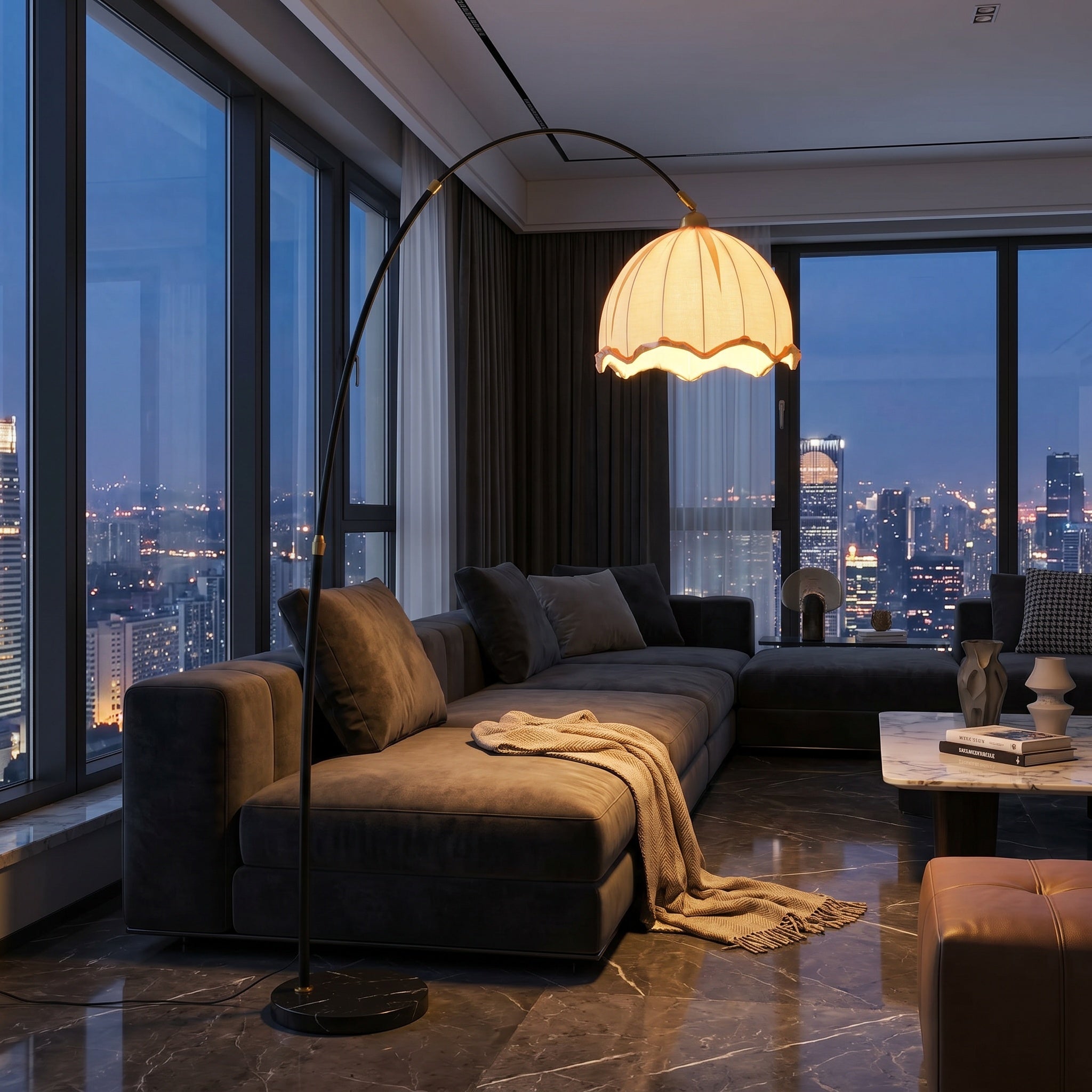 Arc floor lamp with white scalloped shade above a dark sectional in a night city penthouse.