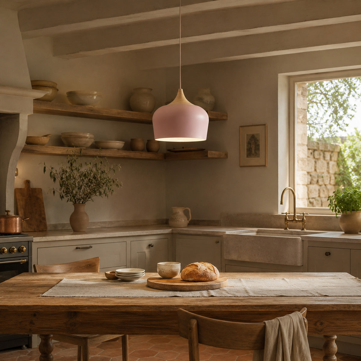 Cobres pendant in soft rose pink with a turned wood cap, the deeper Dome shade, shown in a room