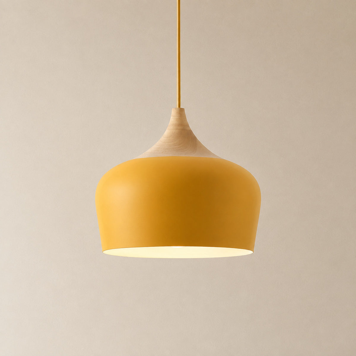 Cobres pendant in warm marigold orange-yellow with a turned wood cap, the deeper Dome shade