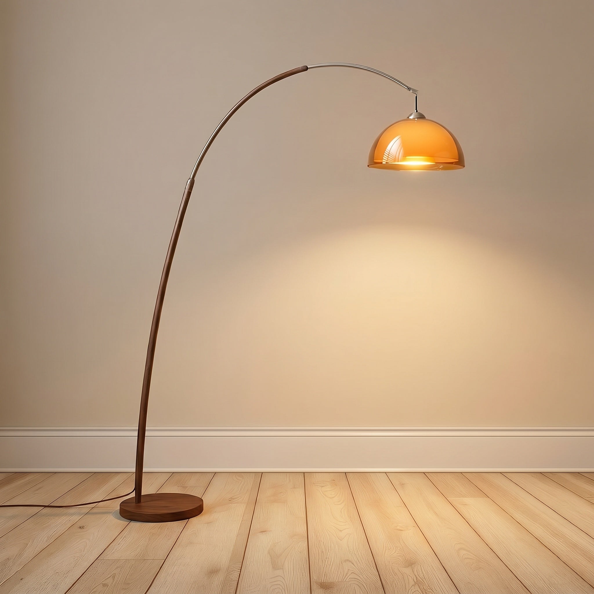 Walnut arc floor lamp with amber chrome-edged dome shade, plain-wall product shot.