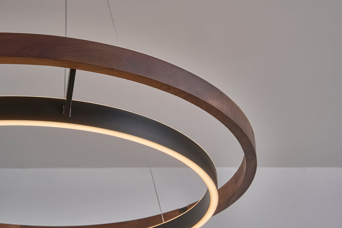 Espargos circular LED ceiling light, close detail of the finish and fittings, the outer ring's wood grain.