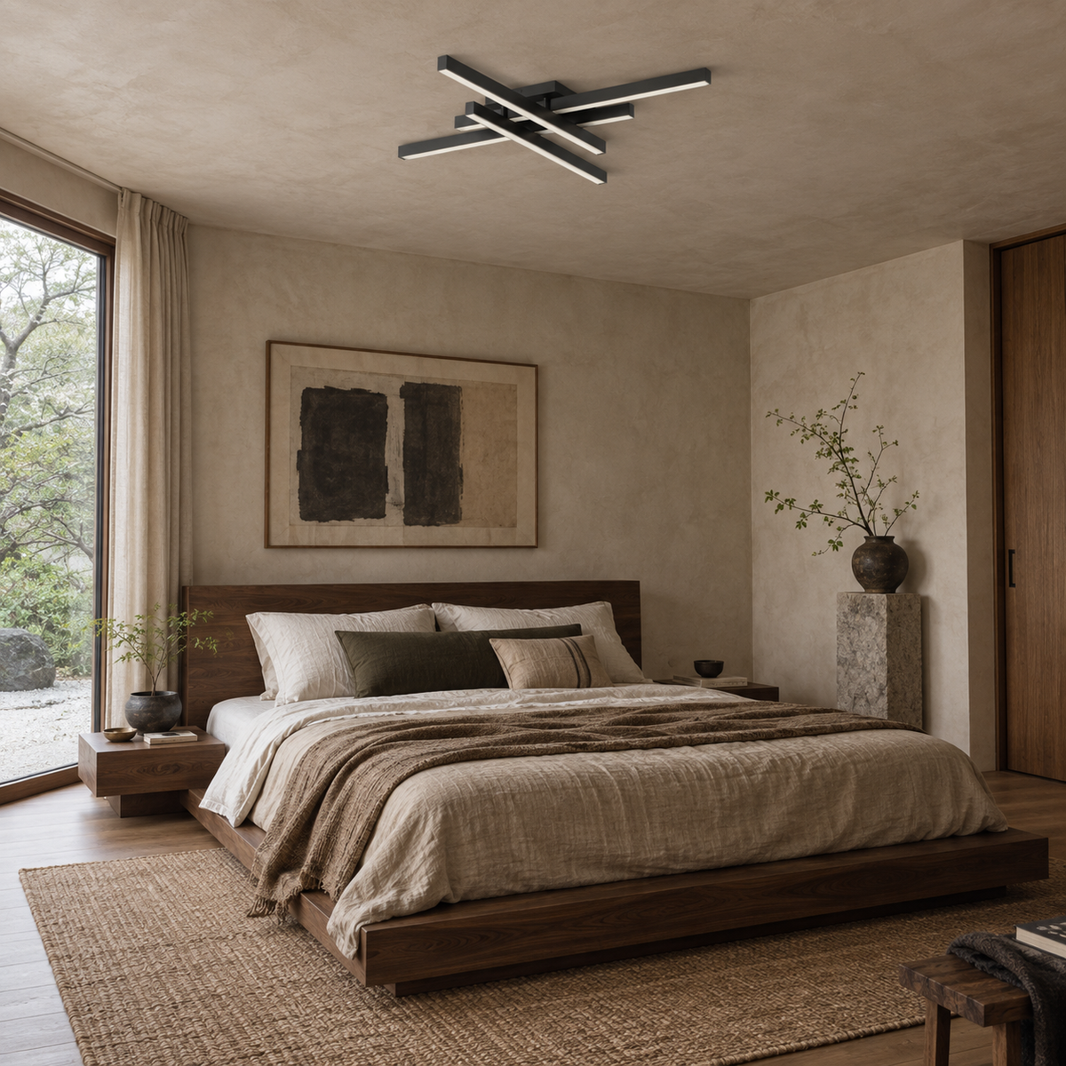 Esposende linear flush mount ceiling light in black, in a bedroom, beside a bed.