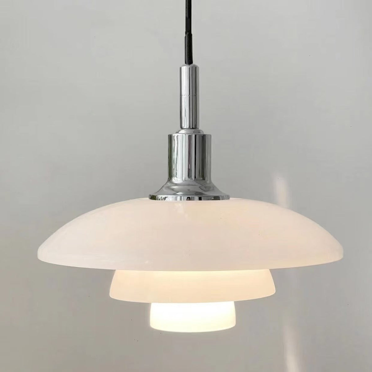 Fundão round ceiling light in chrome, shown against a plain studio background.