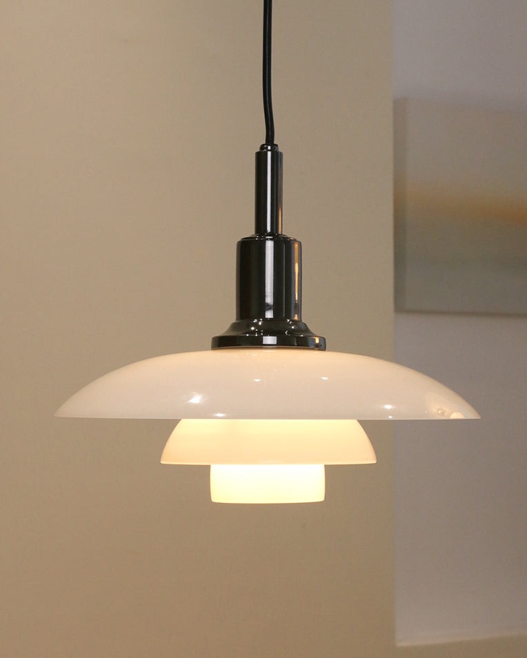 Fundão round ceiling light, in a hallway.
