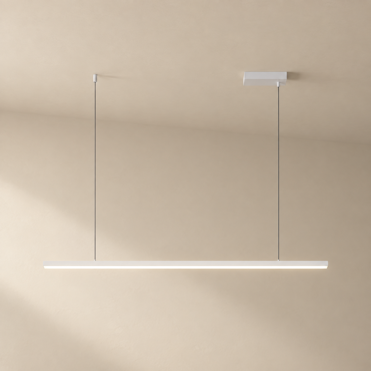 Góis linear LED ceiling light in white, on a plain ceiling.