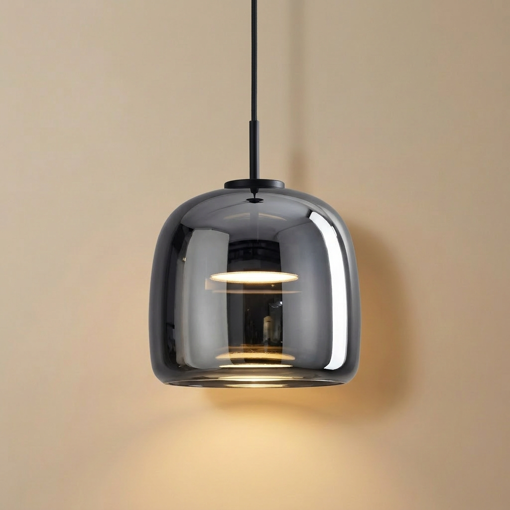 Horta hand-blown glass pendant light, single amber globe shade lit from within