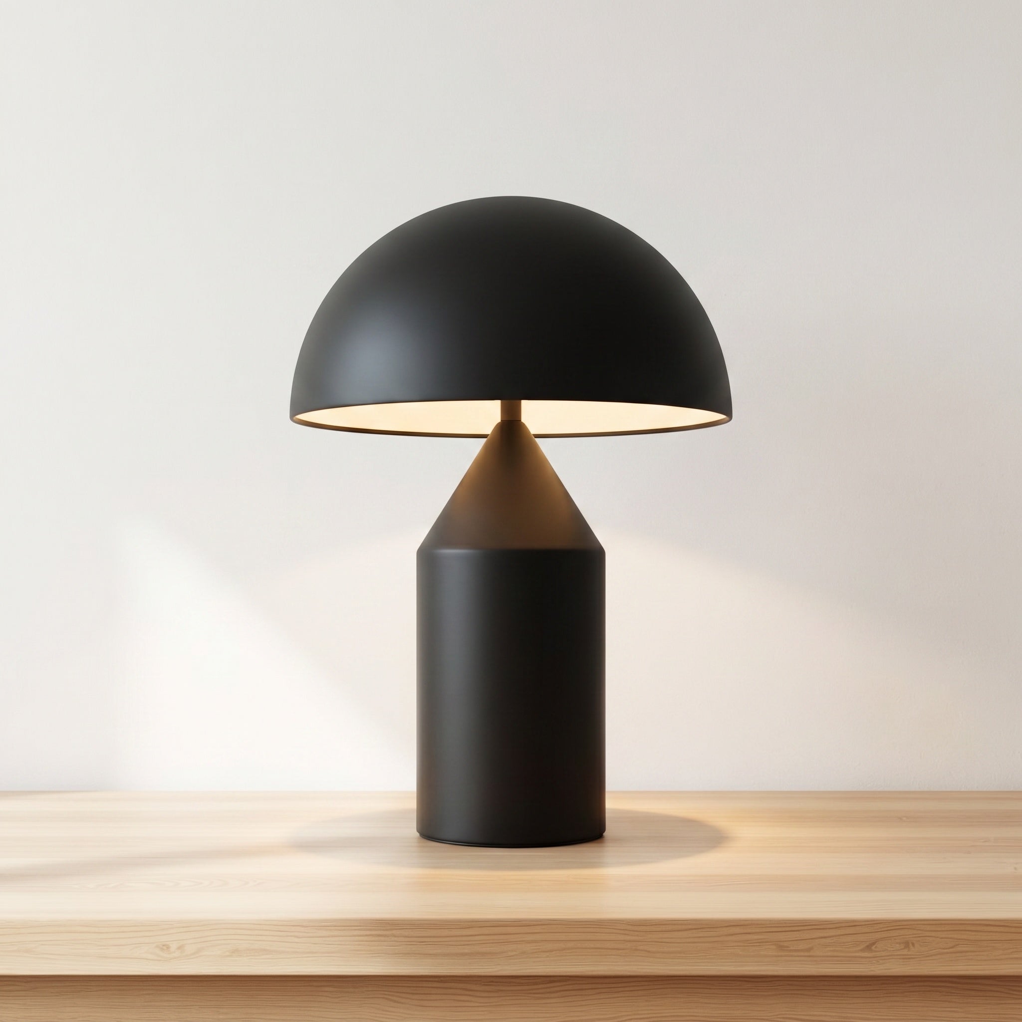 Geometric mushroom table lamp in matte black finish, product shot.