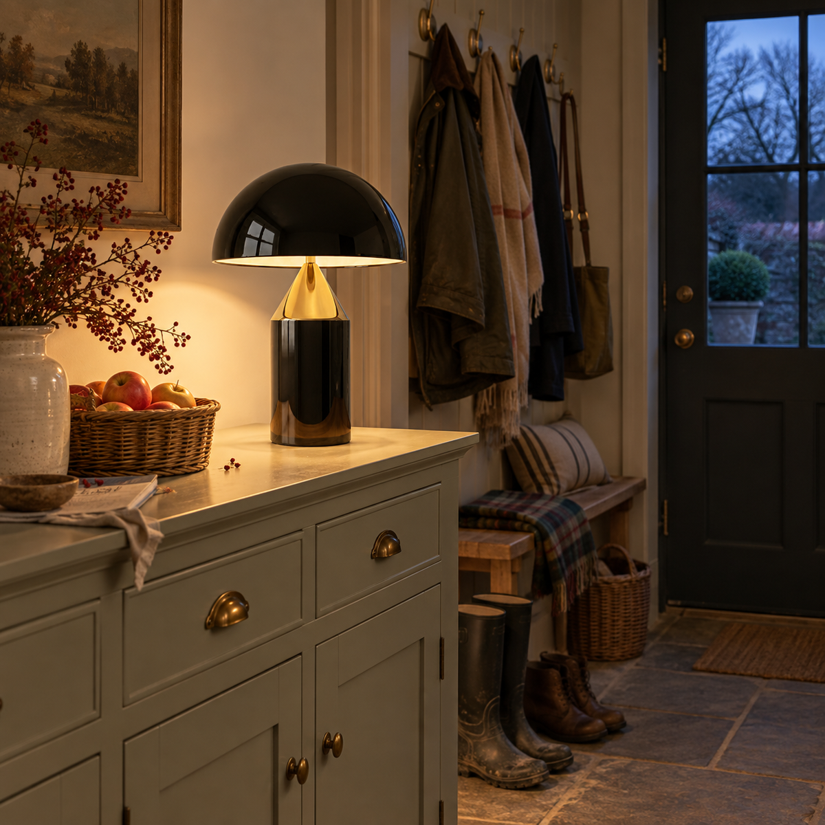 Lagos geometric mushroom table lamp in black, beside a console table.