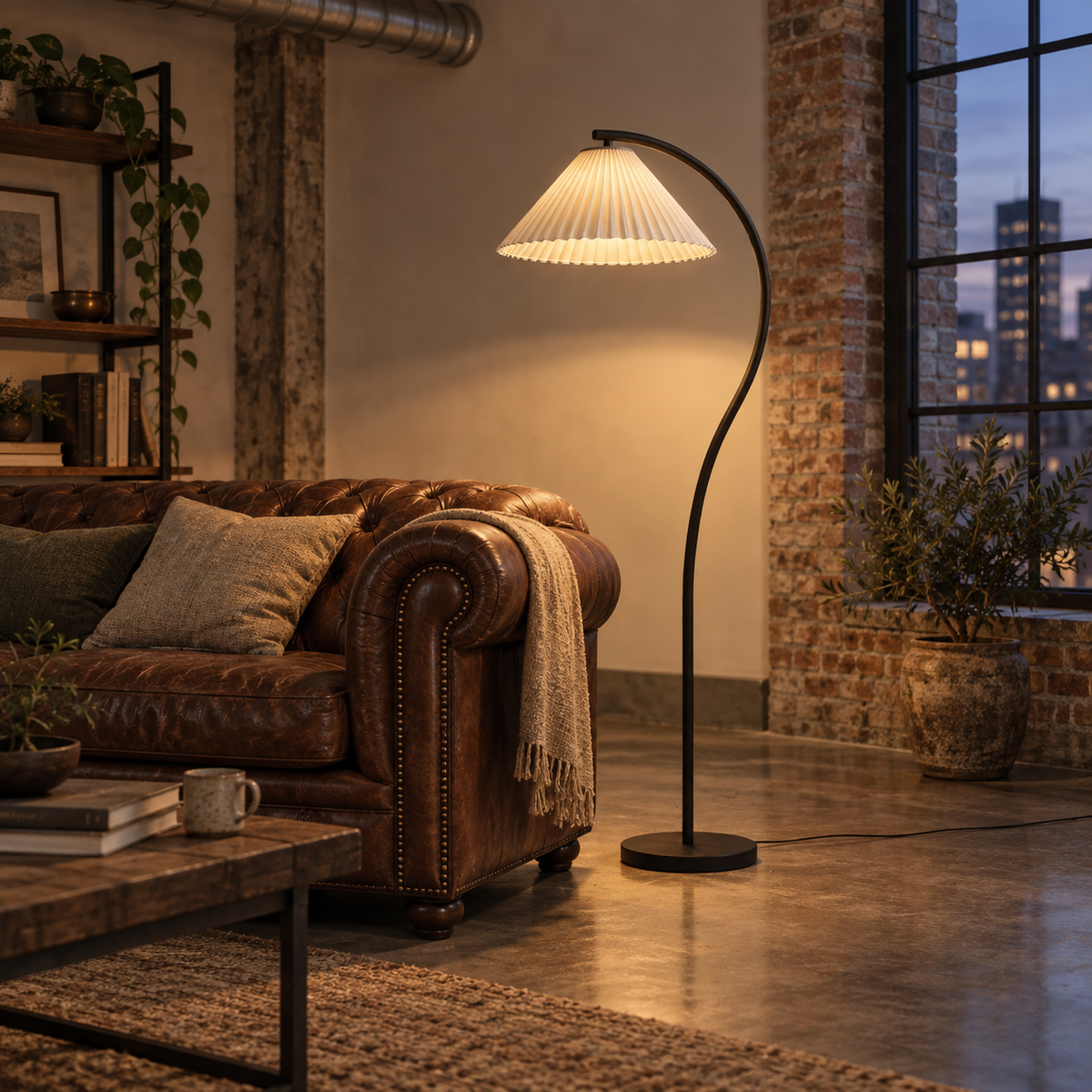 Mafra vintage pleated floor lamp in black, in a loft.