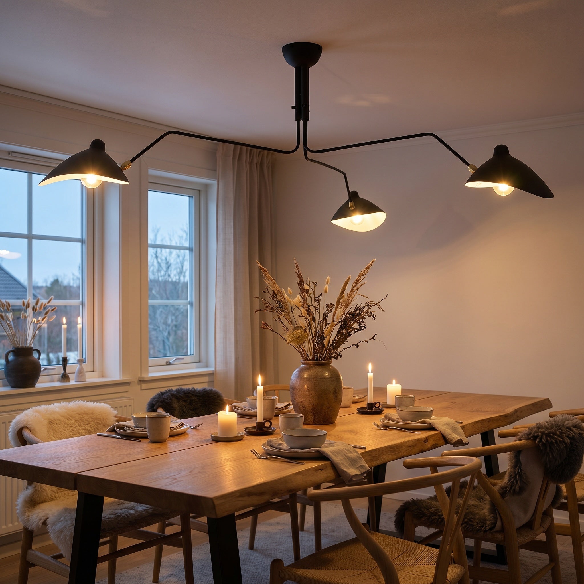 Marvão multi-arm ceiling light with brass hardware above a dining table setting