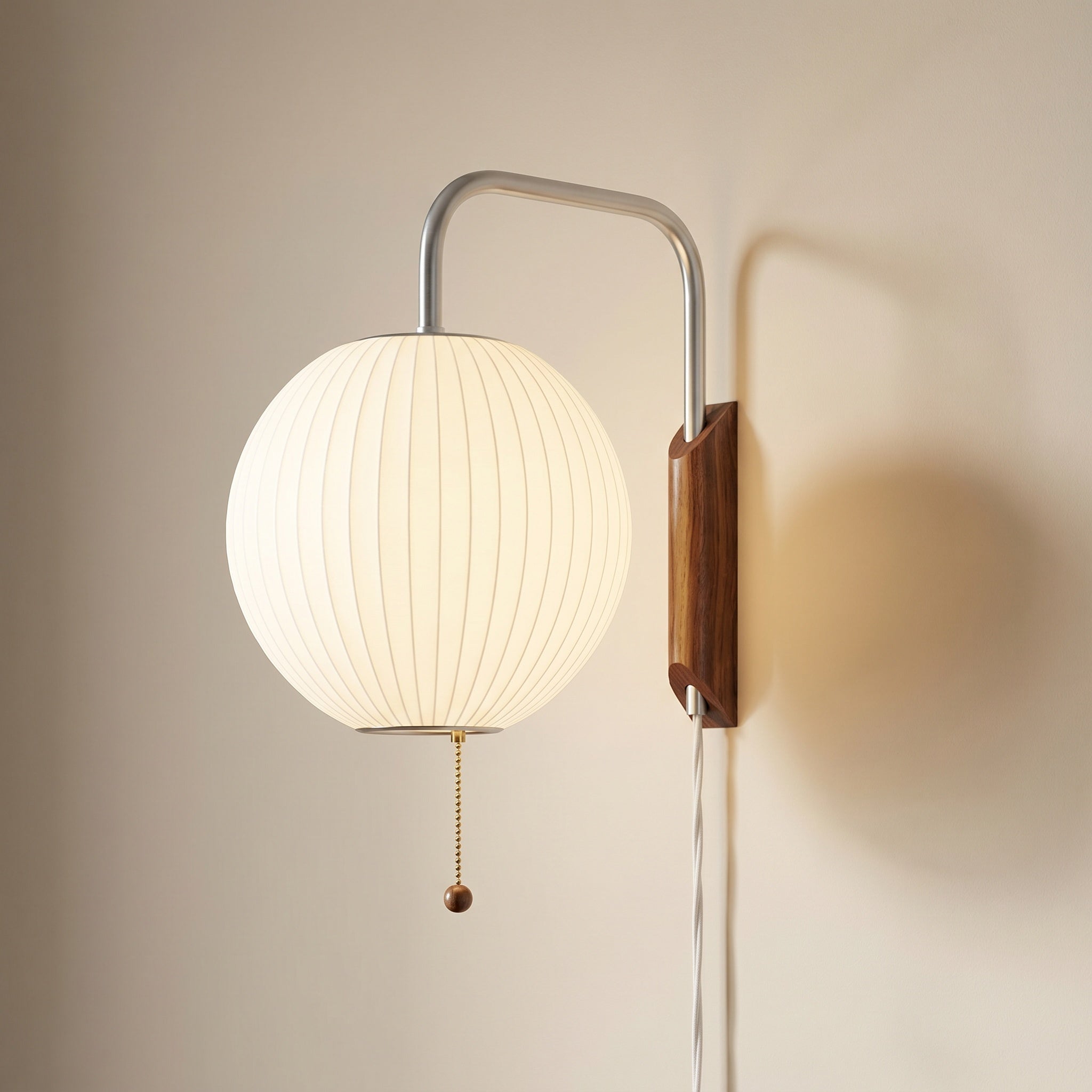 Mirandela globe wall sconce with arm extended, chrome finish and walnut wood accent