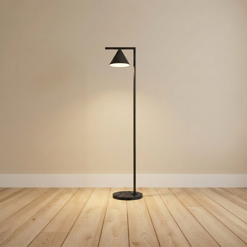 Painted-steel cone floor lamp in black with a Carrara marble base, product shot.