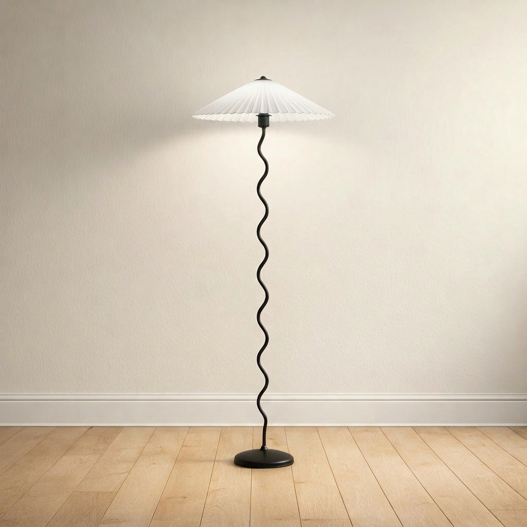 Wavy-stem floor lamp with a white pleated fabric shade, plain-wall product shot.