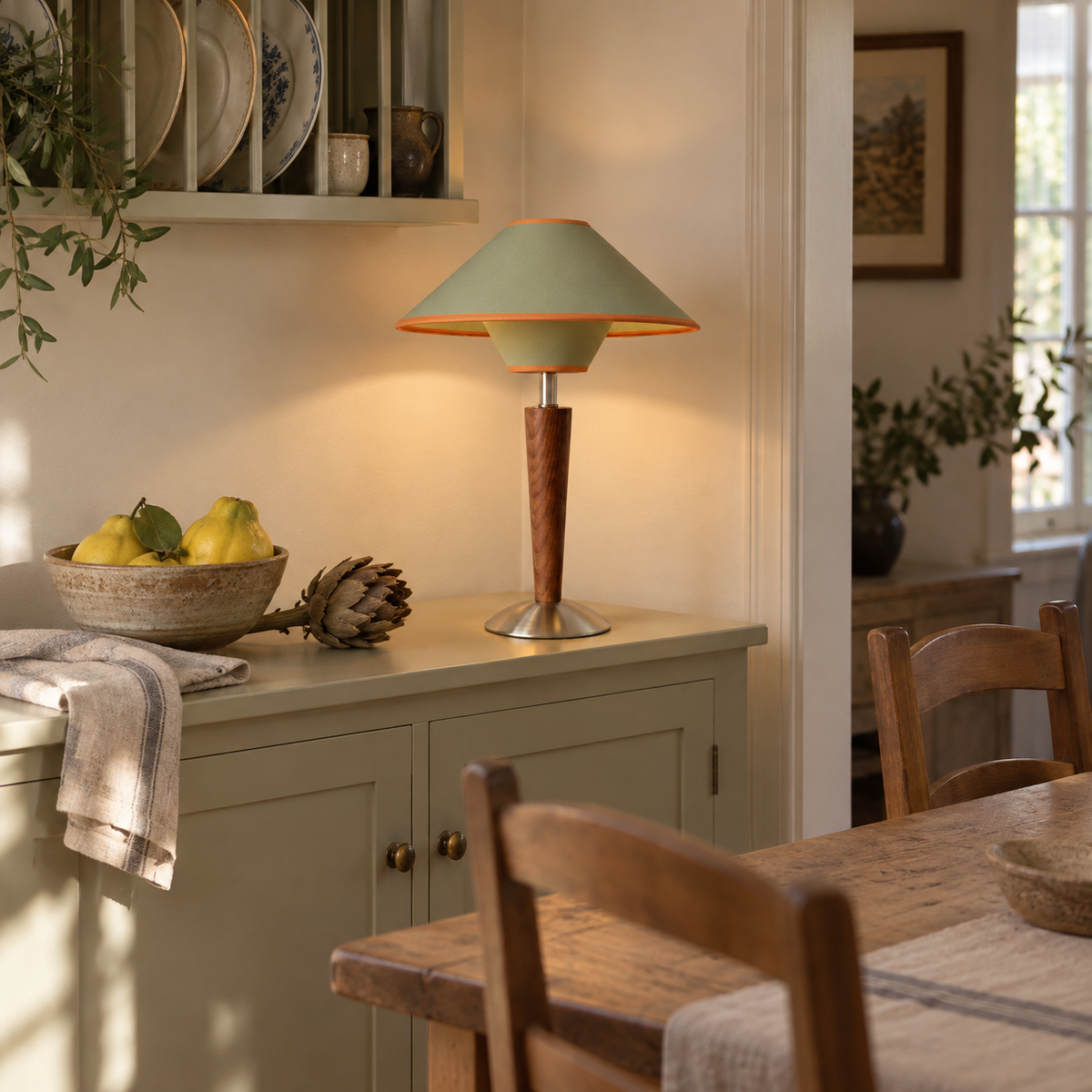 Tavira modern wooden table lamp in green, in a dining room.
