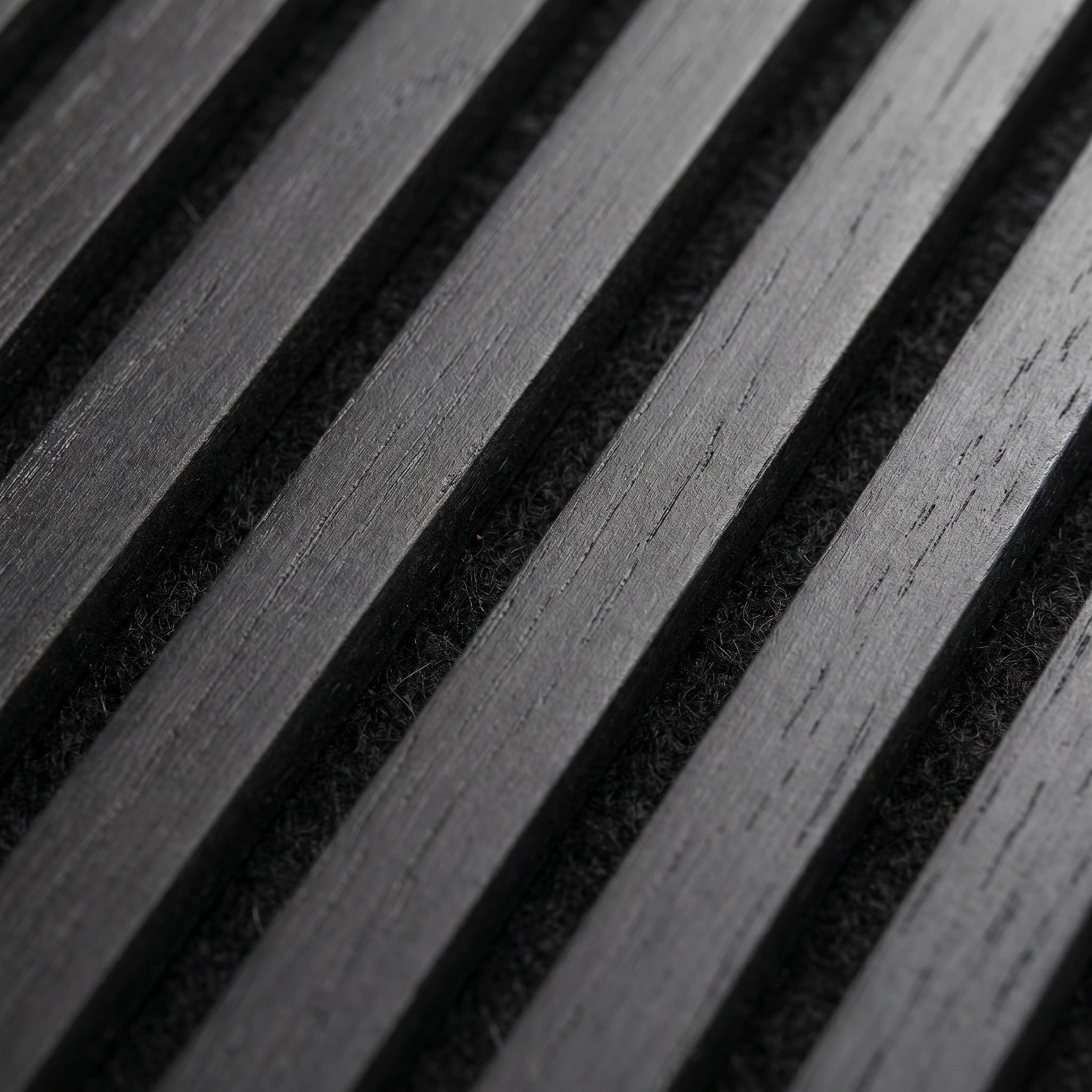 Vela slat panels detail, wood grain at varying depths.