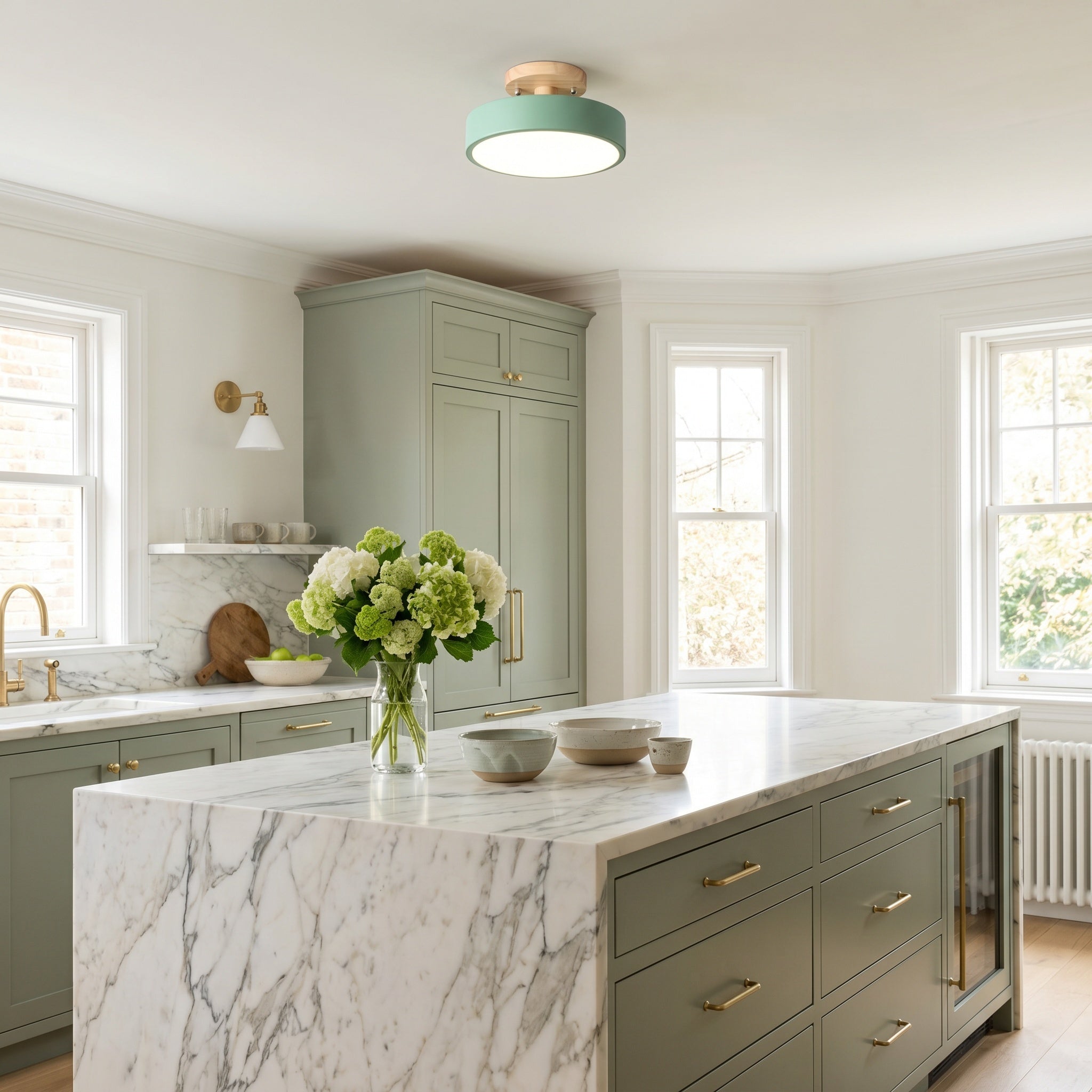 Viseu Nordic LED semi-flush ceiling light, green finish with wood canopy, in a sage green kitchen.