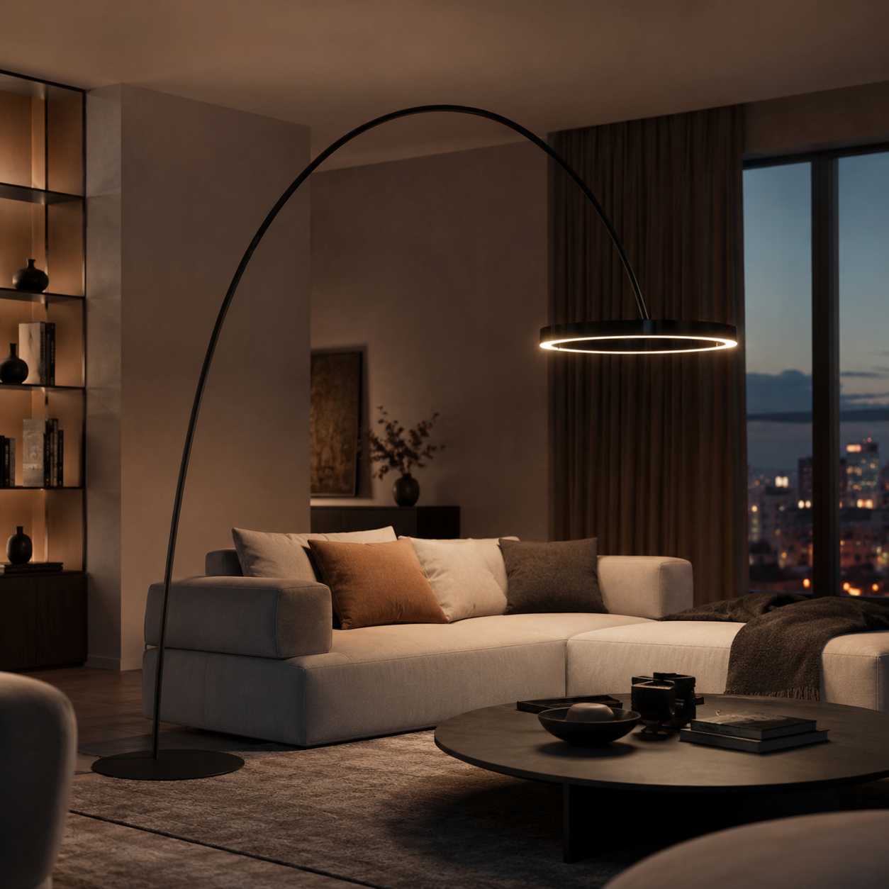 Arched LED floor lamp with brass ring above a beige sofa at dusk with city skyline.