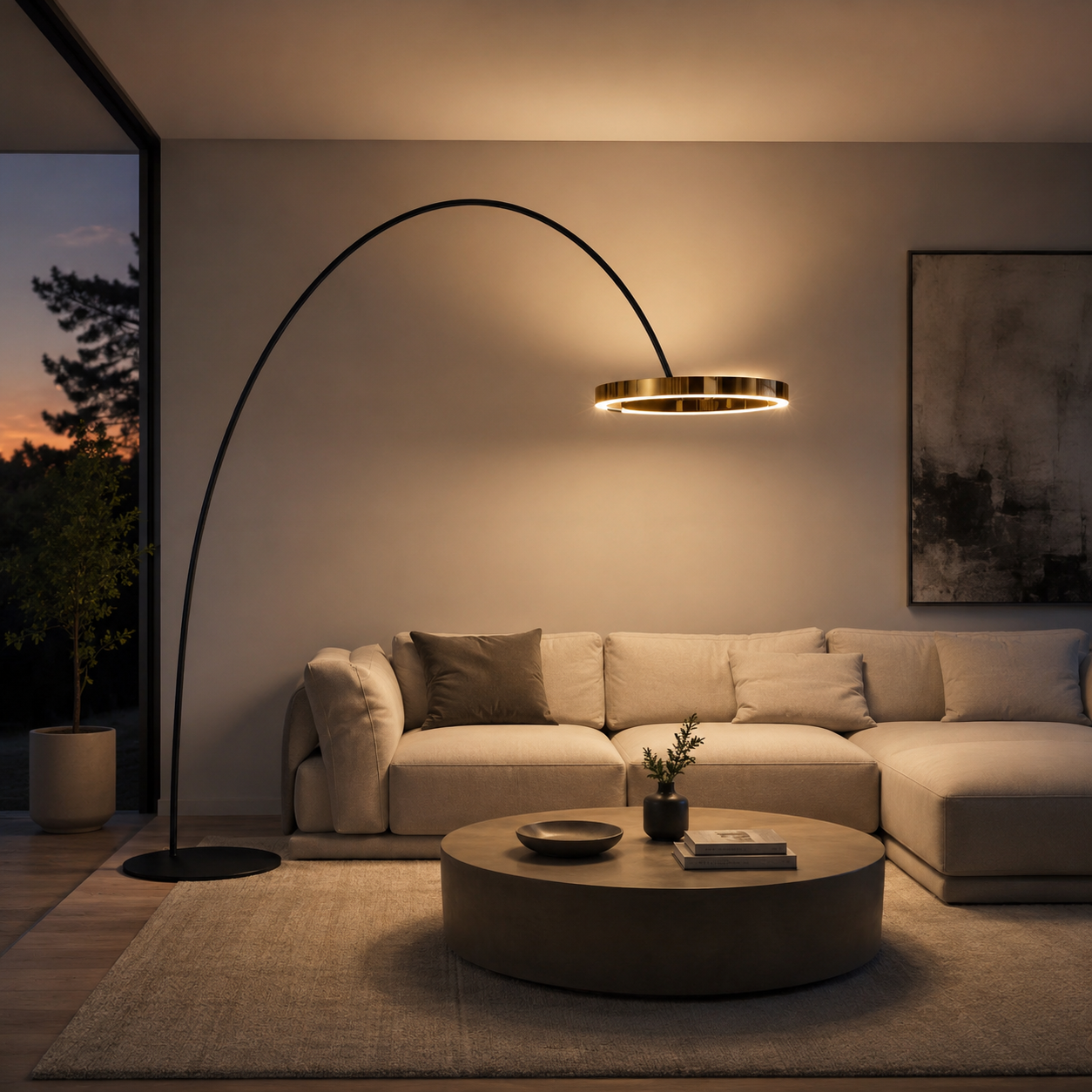 Arched LED floor lamp with brass ring above a beige sectional sofa at dusk.