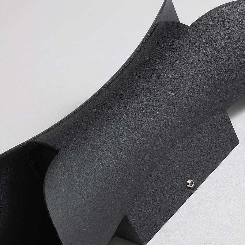Águeda wall light in bedroom space with warm ambient interior lighting