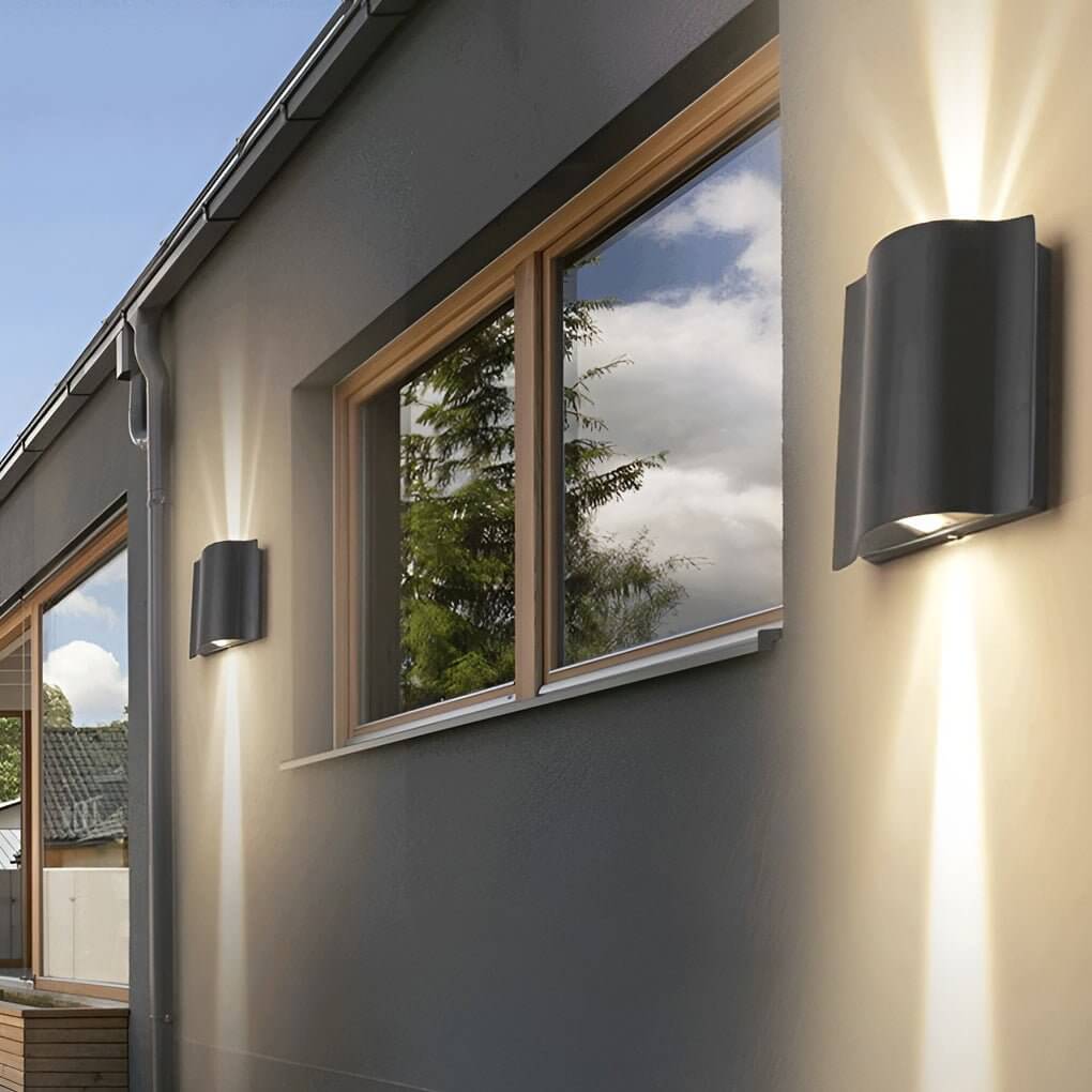 Almeida outdoor wall sconce in black, wavy aluminum, hero shot