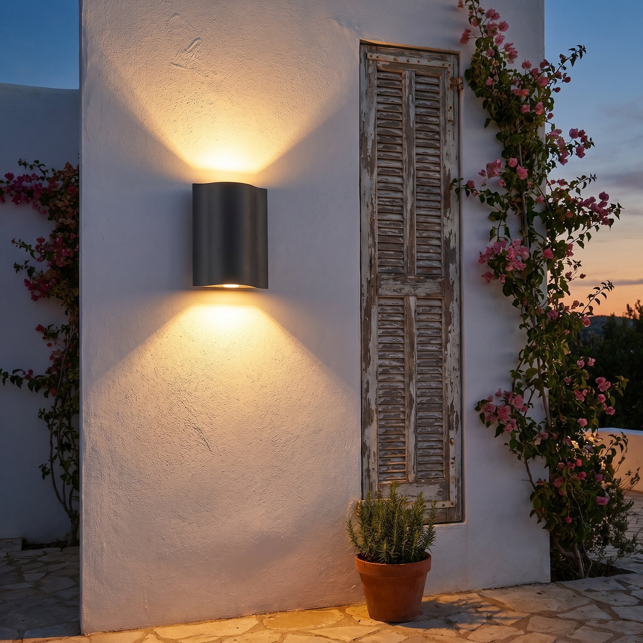 Almeida outdoor wall sconce, lifestyle shot on stone facade