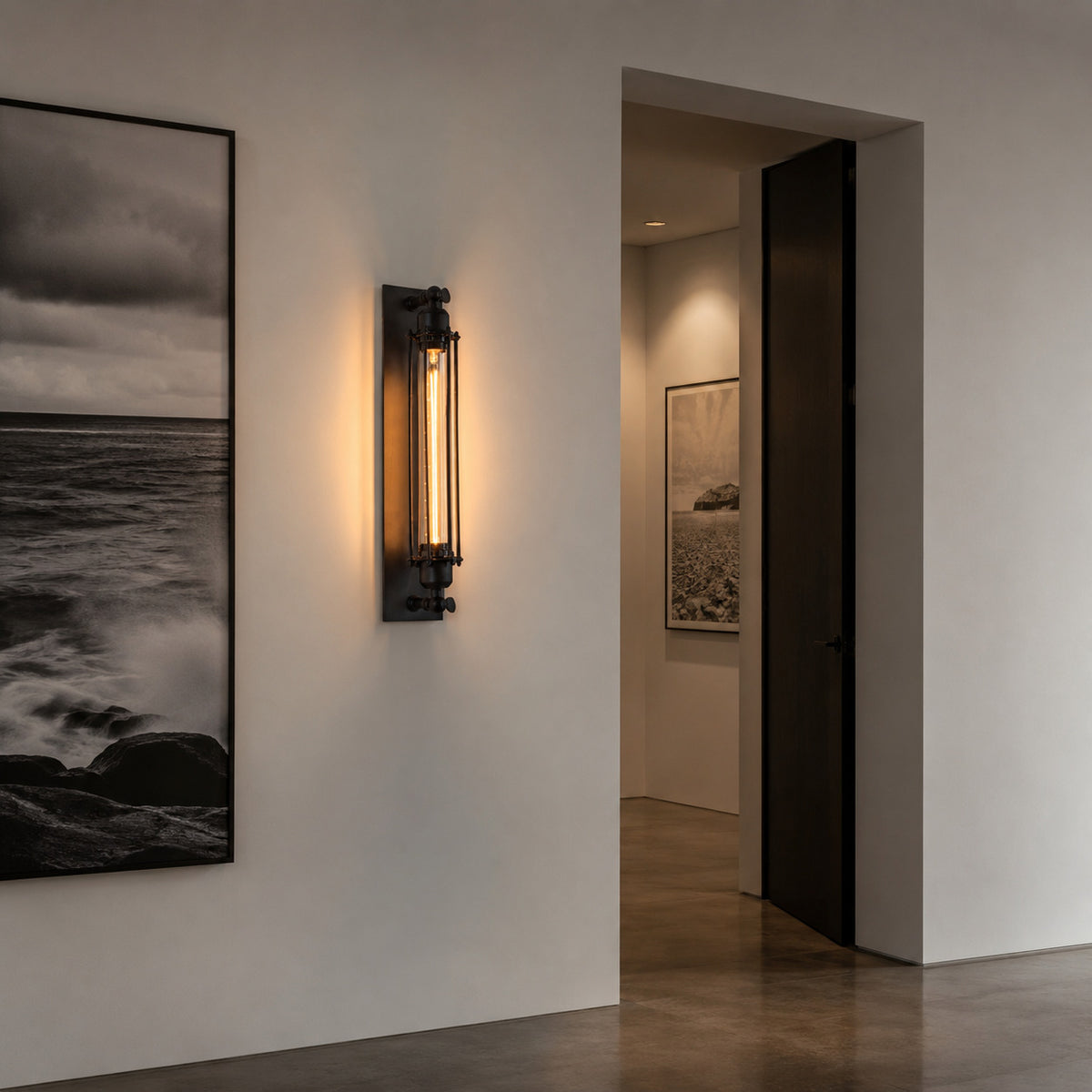 Almonda sconce in a private art collector's hallway