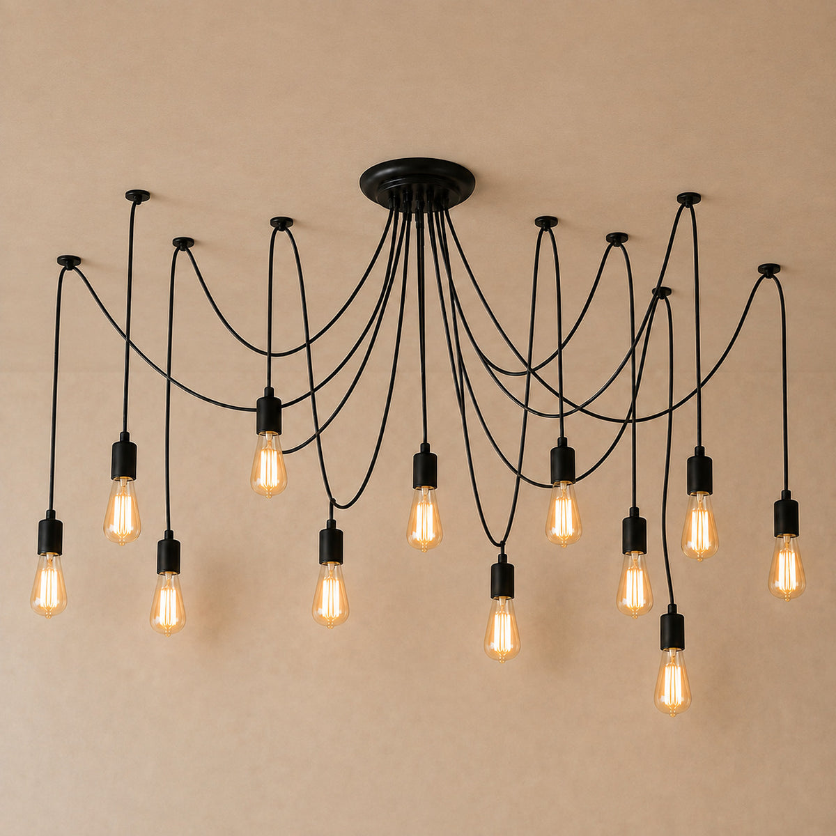 Anadia spider chandelier in matte black, 12 cable version, twelve bare Edison bulbs on one ceiling plate