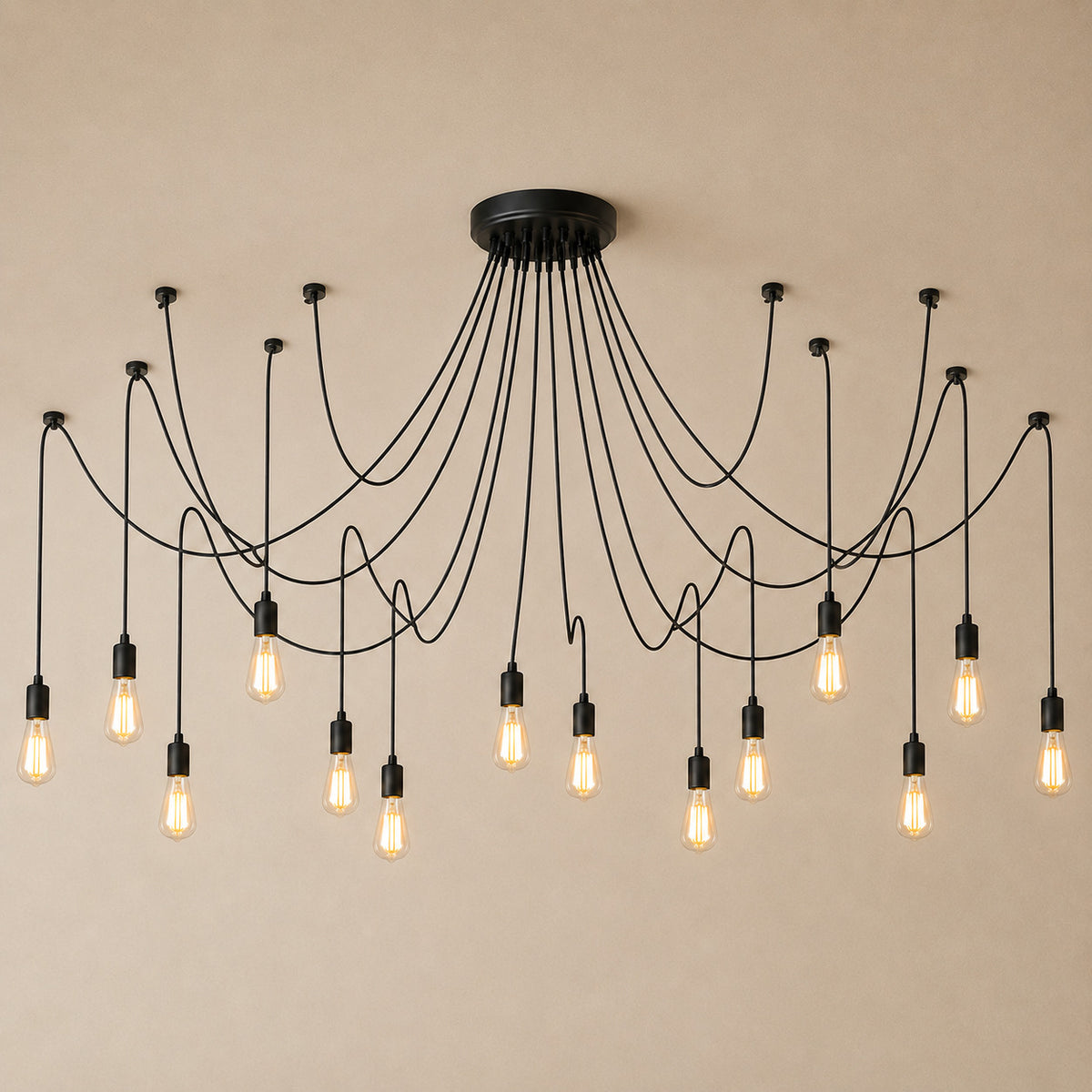 Anadia spider chandelier in matte black, 14 cable version, fourteen bare Edison bulbs on one ceiling plate