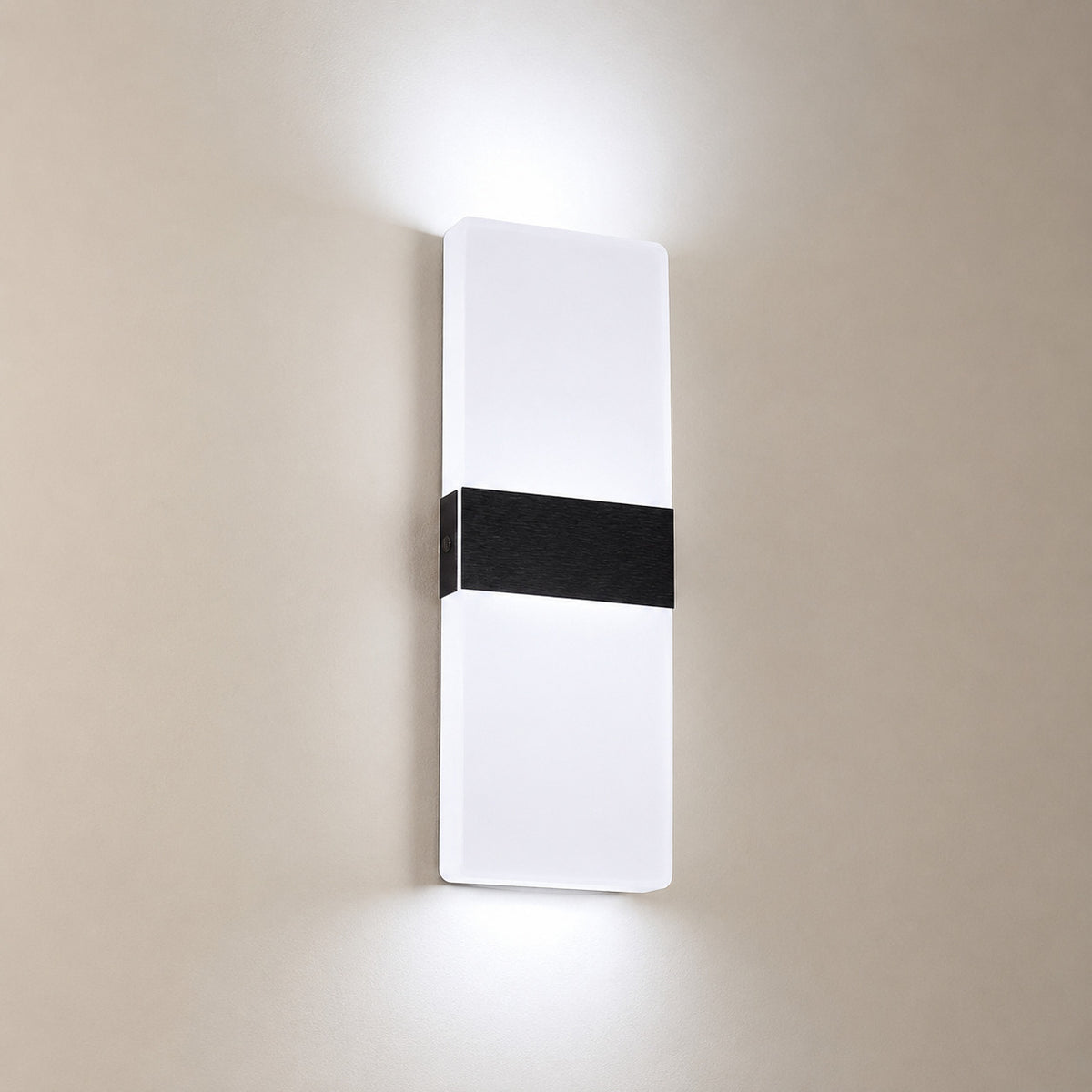 Anços strip LED wall sconce with a black band on a frosted acrylic panel, cool white light