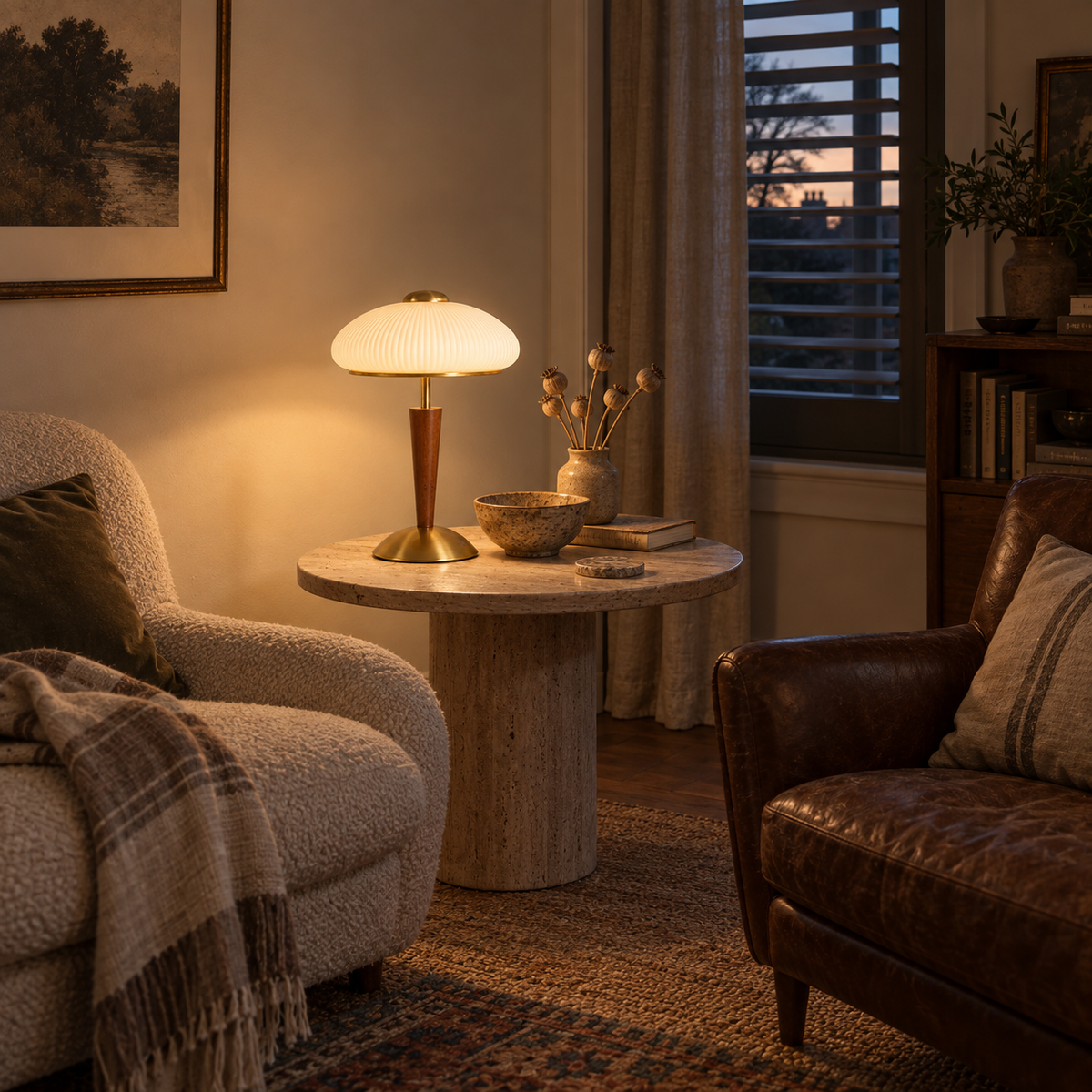 Arda fluted dome table lamp, walnut color & gold & white finishes, in a sitting room.