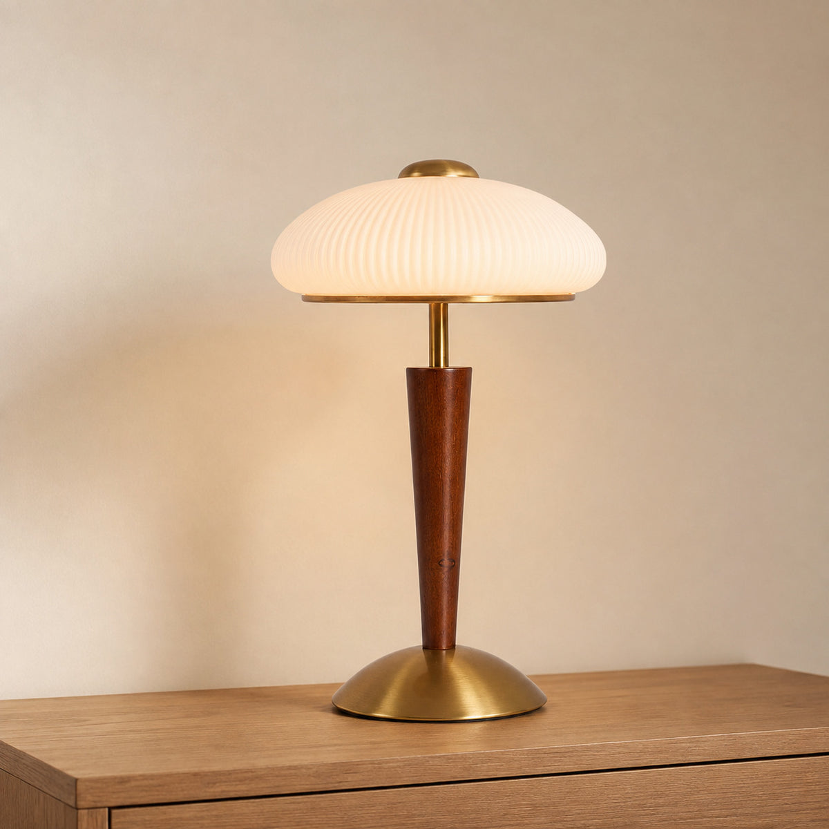 Arda fluted dome table lamp with a ribbed opal glass shade, brass collar and walnut stem, 38 cm tall