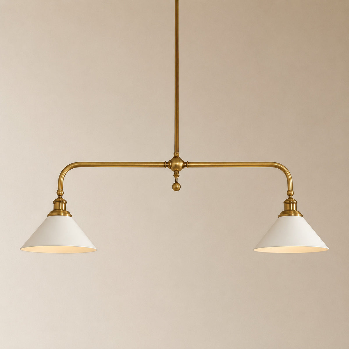 Ardila linear pendant with an aged brass bar and two white aluminium cone shades