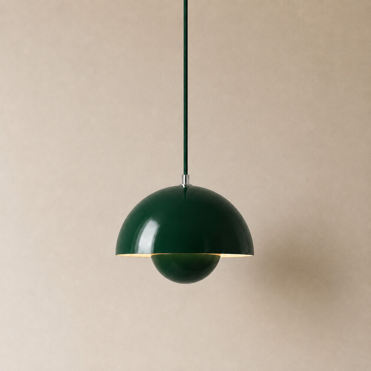 Ave hemisphere pendant in dark green on a matching fabric cord, 16 cm tall