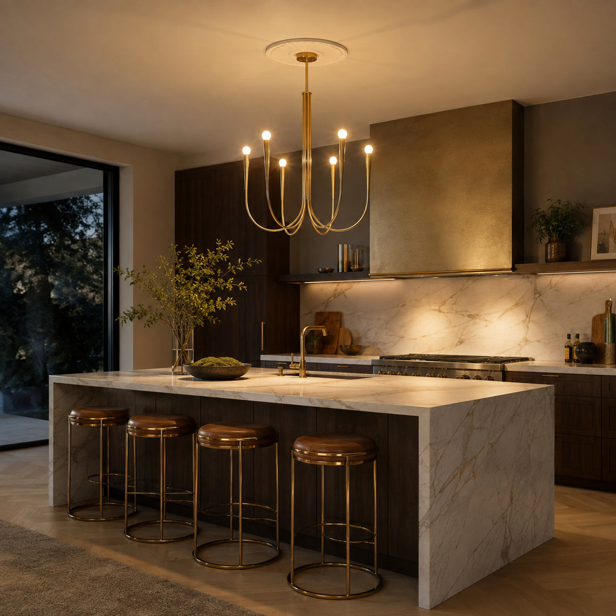 Balsemão curved-arm chandelier in polished gold with 6 arms, shown in a room