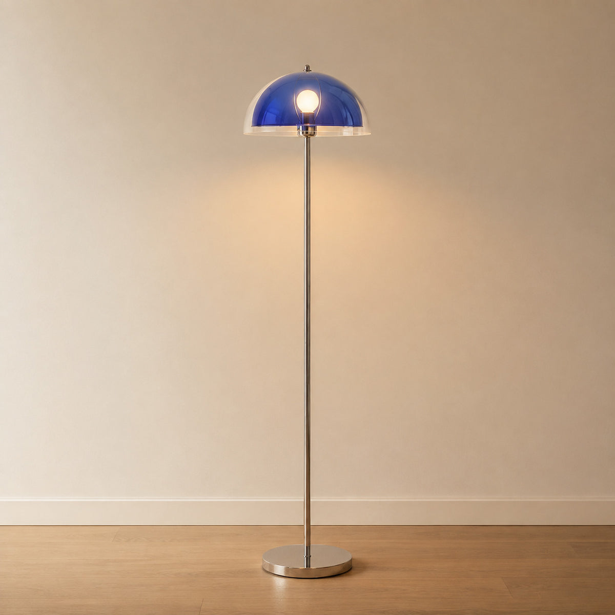 Benavente floor lamp with a deep cobalt-blue inner dome under a clear acrylic outer shade, chrome stem, 155 cm tall