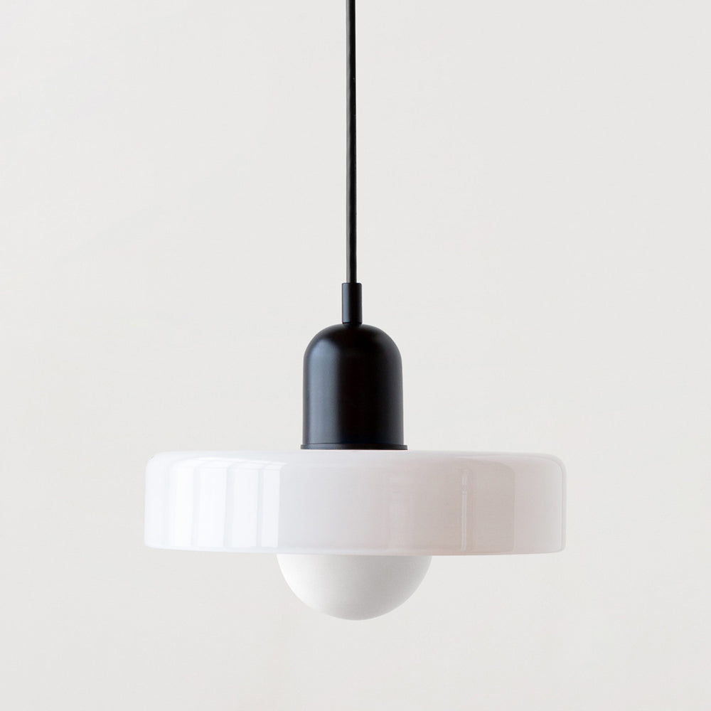 Bragança Stained Glass Orb Pendant Light angled studio view of the lit shade