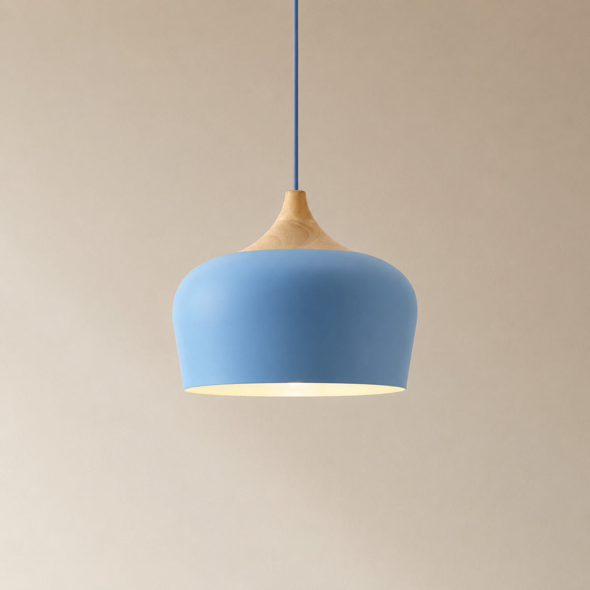 Cobres pendant in clear mid blue with a turned wood cap, the deeper Dome shade