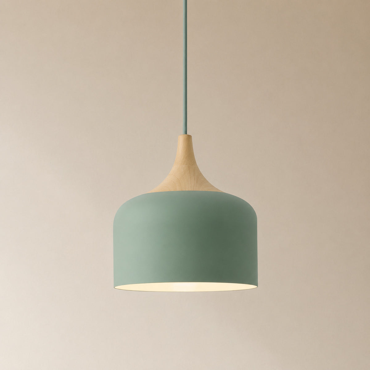 Cobres pendant in fresh mid-green with a turned wood cap, the deeper Dome shade