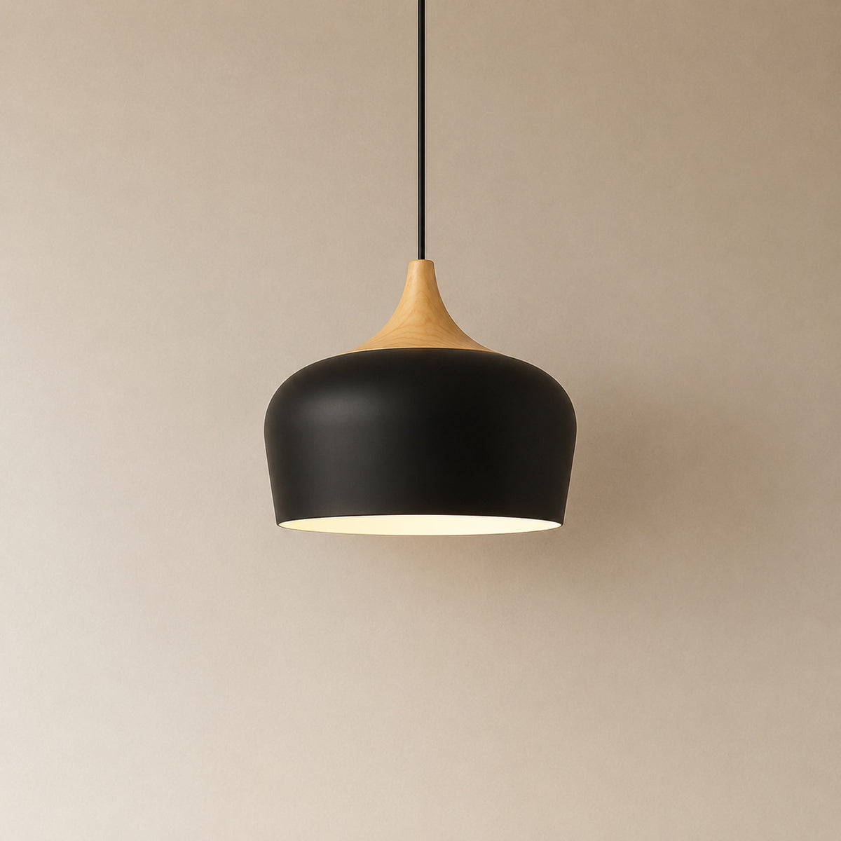 Cobres pendant in matte black with a turned wood cap, the deeper Dome shade